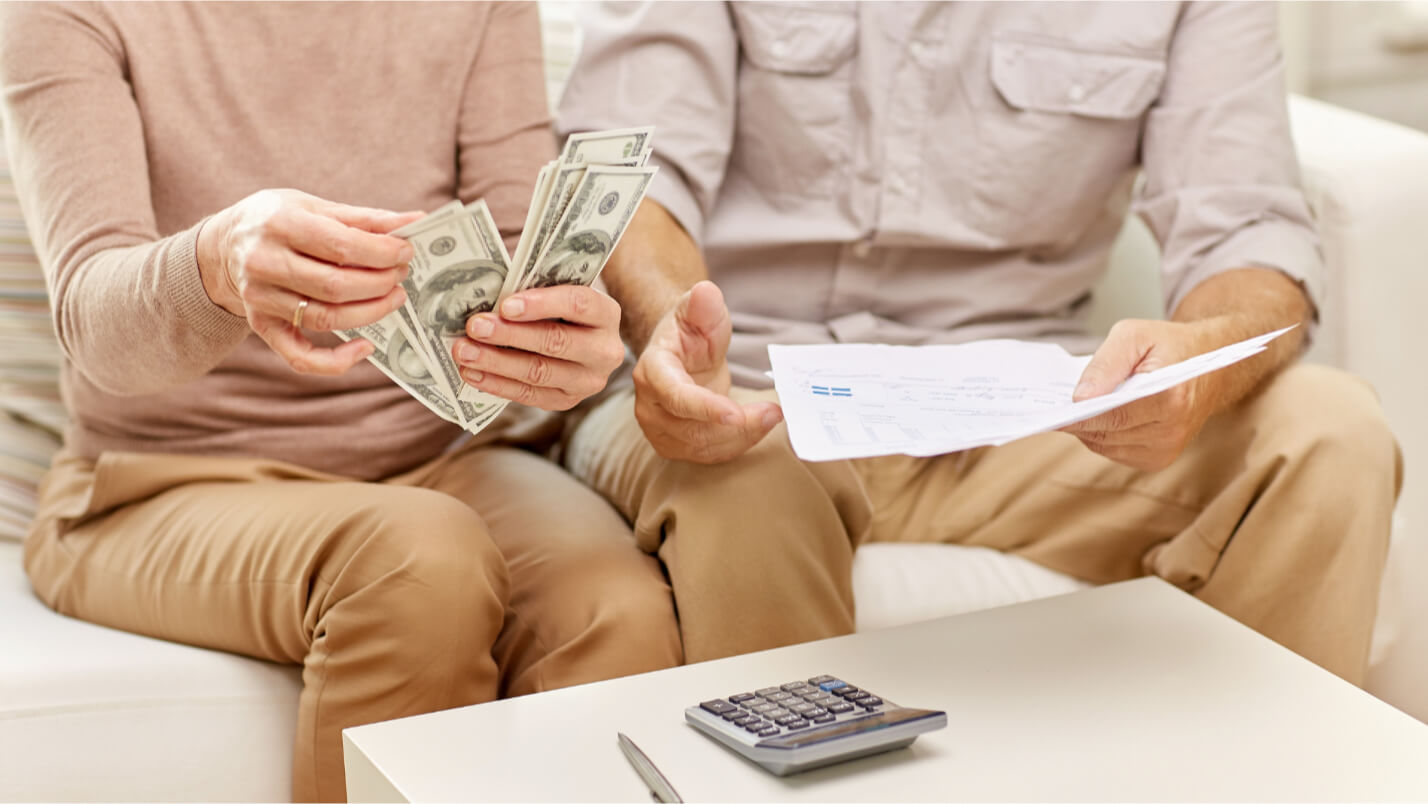 Couple Counting Paper Bills
