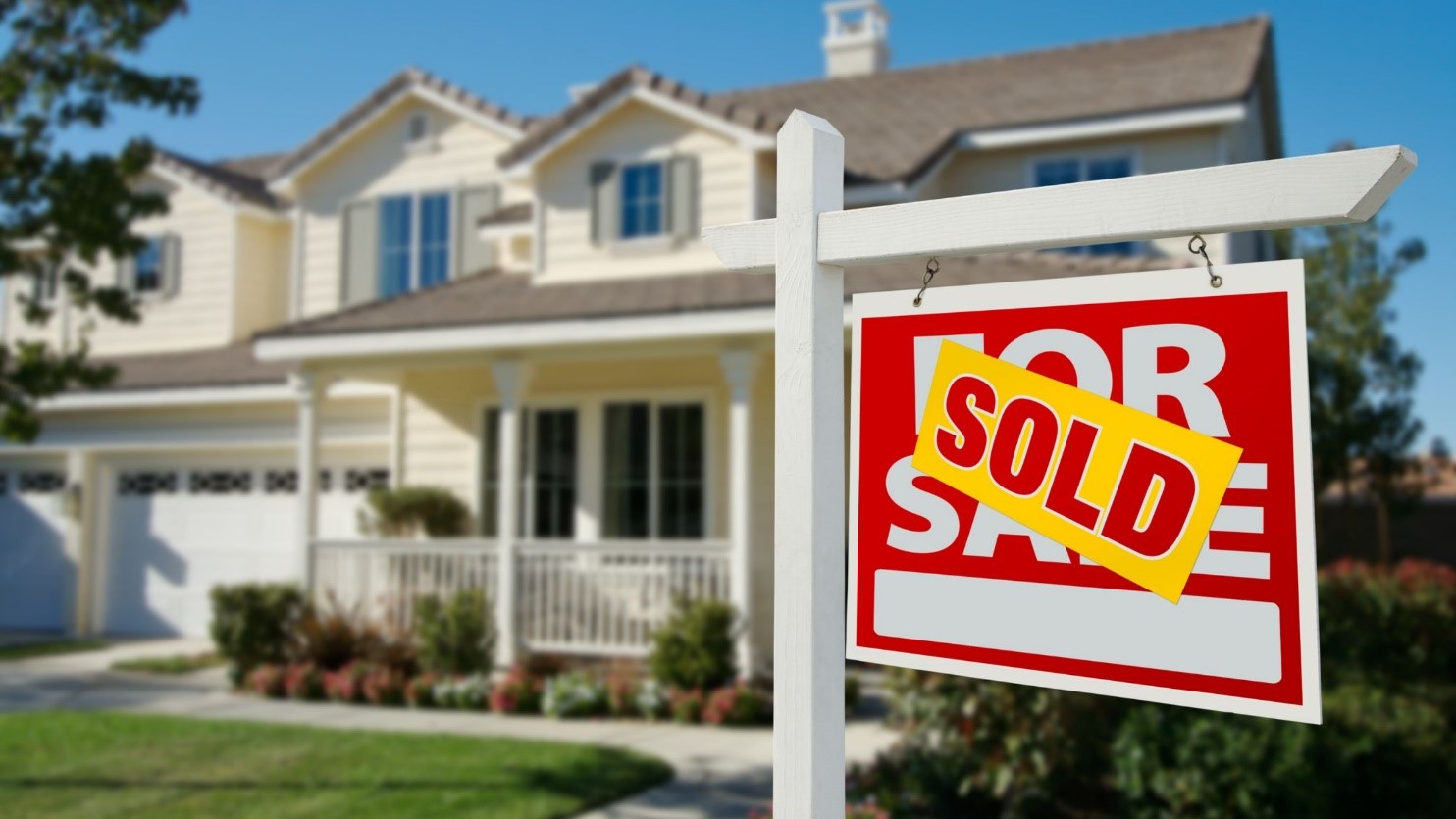 House with a sold sign