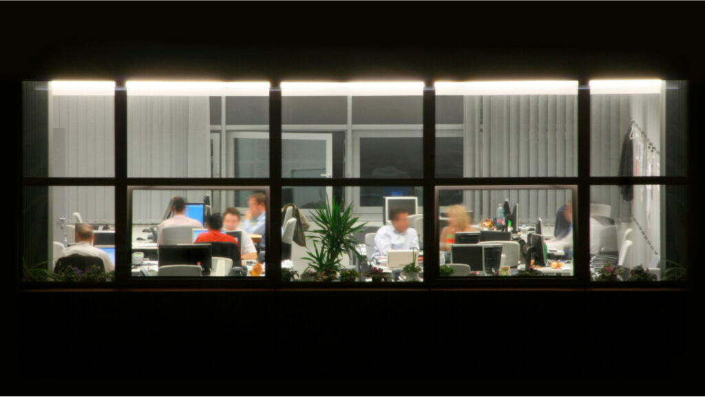 A group of people working at computers
