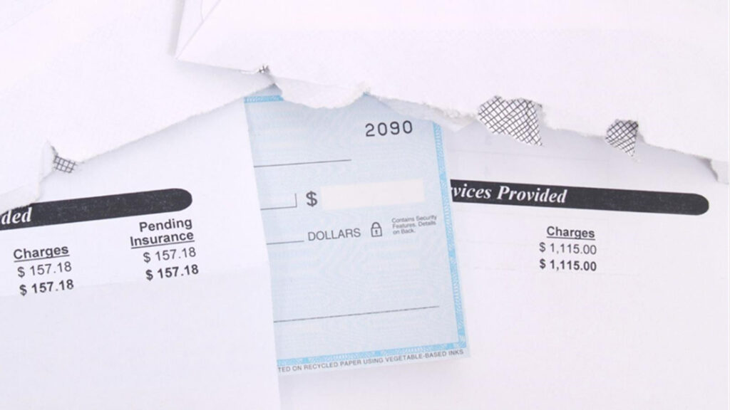 A close-up of several receipts